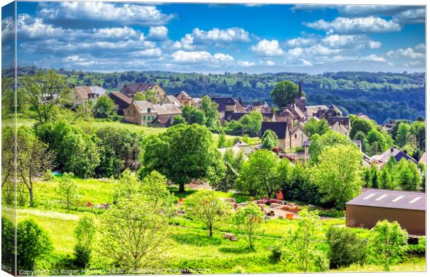 Serene French Village Amidst Lush Greenery Canvas Print by Roger Mechan