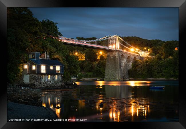 Menai Bridge glowing in the straits Framed Print by Karl McCarthy