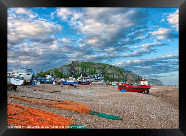 Fishing Boats On Hastings Beach With Evening Sky Framed Print by Rick Lindley