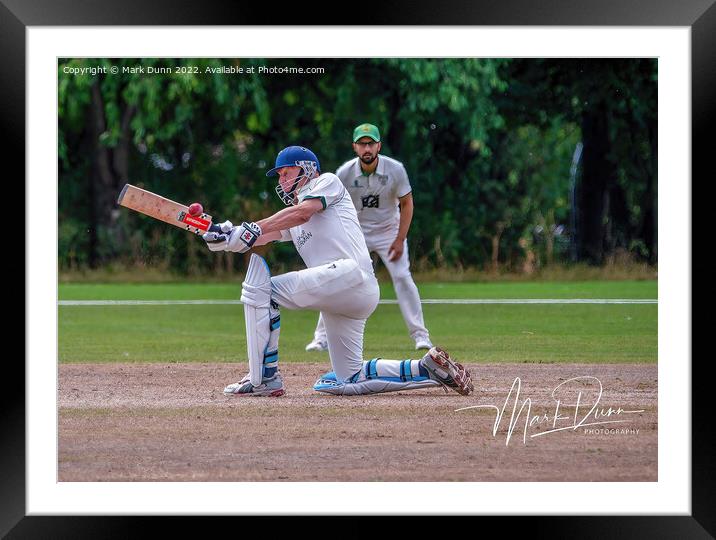 Man batting a cricket ball Framed Mounted Print by Mark Dunn