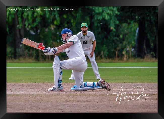 Man batting a cricket ball Framed Print by Mark Dunn