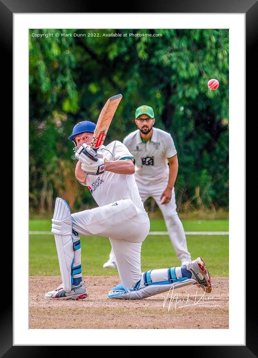 A cricketer batting a ball Framed Mounted Print by Mark Dunn