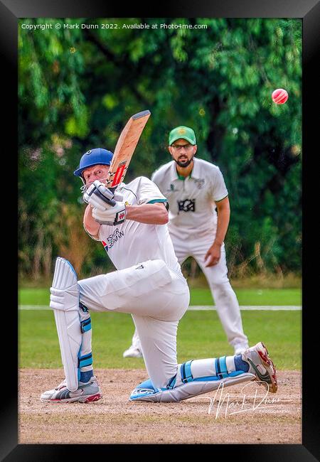 A cricketer batting a ball Framed Print by Mark Dunn
