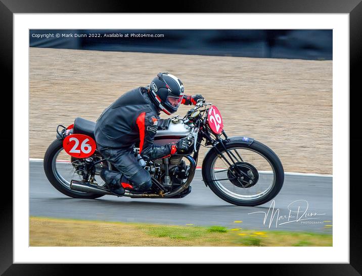 Racing a classic motorcycle Framed Mounted Print by Mark Dunn