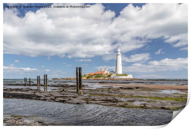 St Marys lighthouse and jetty posts Print by Graham Moore