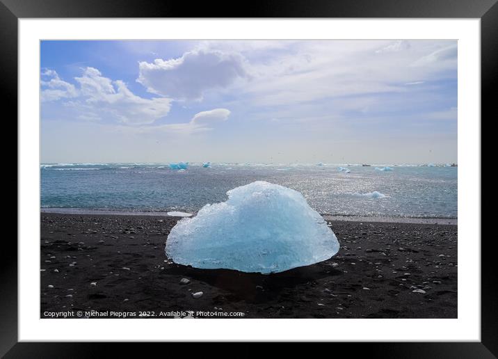 Diamond Beach in Iceland with blue icebergs melting on black san Framed Mounted Print by Michael Piepgras