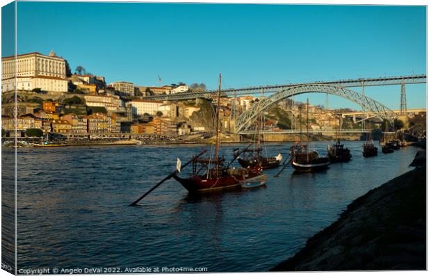 View of Douro river and boats in Porto Canvas Print by Angelo DeVal