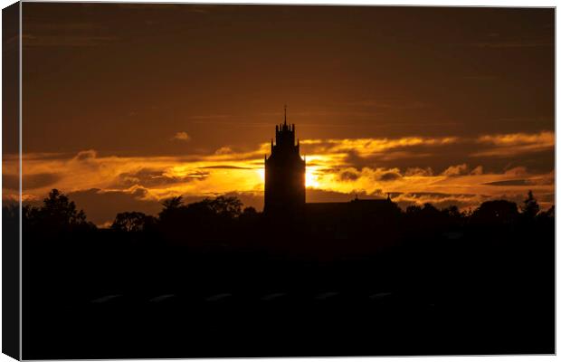 Sunset behind St Andrew's church, Sutton-in-the-Isle, Cambridges Canvas Print by Andrew Sharpe