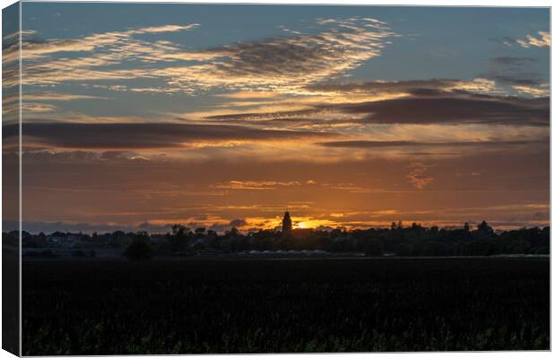 Sunset behind St Andrew's church, Sutton-in-the-Isle, Cambridges Canvas Print by Andrew Sharpe