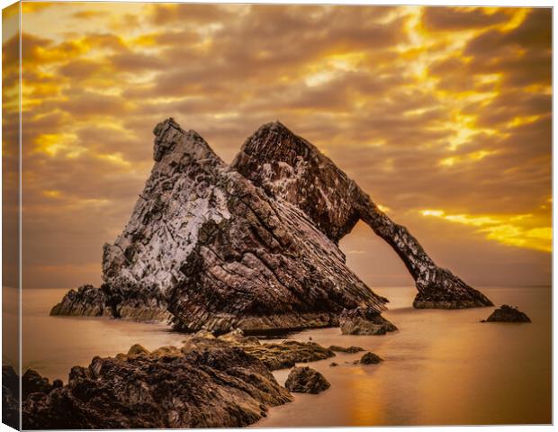 Sunrise at Bow Fiddle Rock in Scotland Canvas Print by DAVID FRANCIS