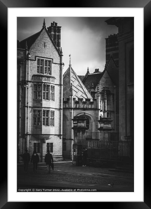 People walking the streets of Oxford Framed Mounted Print by Gary Turner
