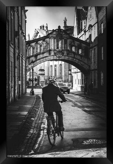 Cyclist under the Bridge of Sighs, Oxford Framed Print by Gary Turner