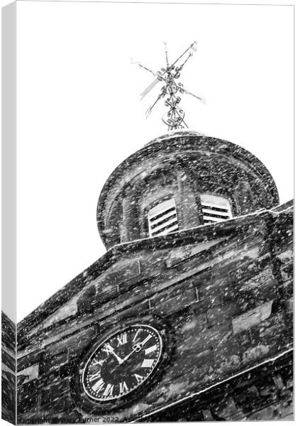 Church clock in the snow Canvas Print by Gary Turner