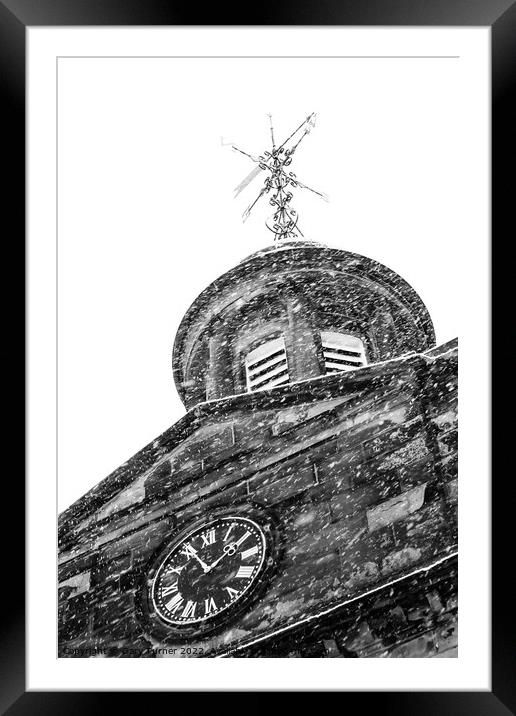 Church clock in the snow Framed Mounted Print by Gary Turner