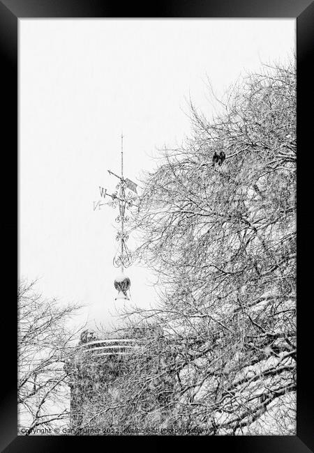 Snow covered church spire Framed Print by Gary Turner