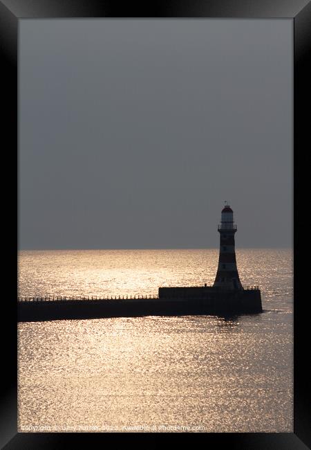 Sunrise Over Roker Pier Lighthouse Framed Print by Gary Turner
