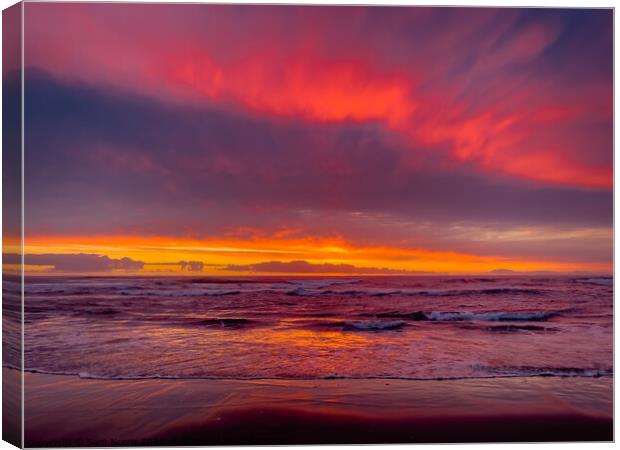 Red sunset over beach Canvas Print by Sam Norris