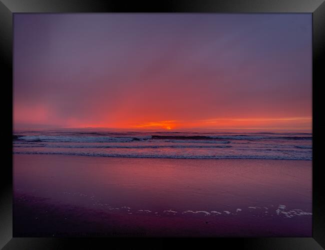 A foggy beach sunset Framed Print by Sam Norris