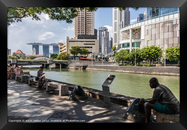 Relaxing by the Singapore River, Clarke Quay, Singapore Framed Print by Kevin Hellon