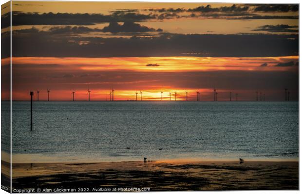Wind farm at sunset  Canvas Print by Alan Glicksman