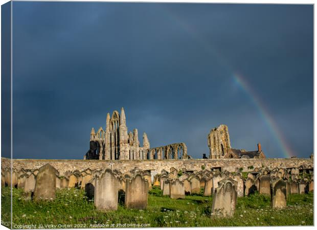 A rainbow over Whitby Abbey, Yorkshire Canvas Print by Vicky Outen