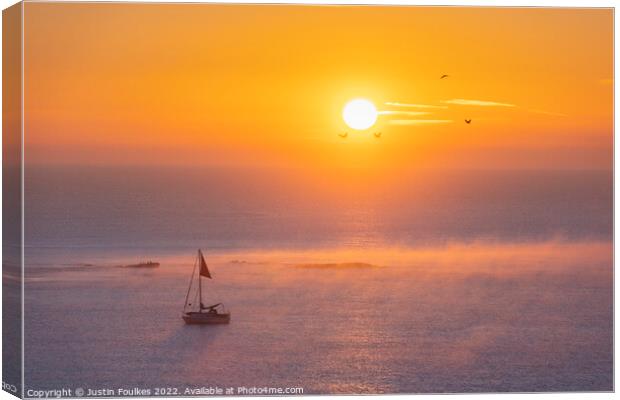 Sunrise over the bay, Budleigh Salterton, Devon Canvas Print by Justin Foulkes