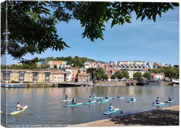 Paddle boards in Bristol harbour  Canvas Print by Les Schofield