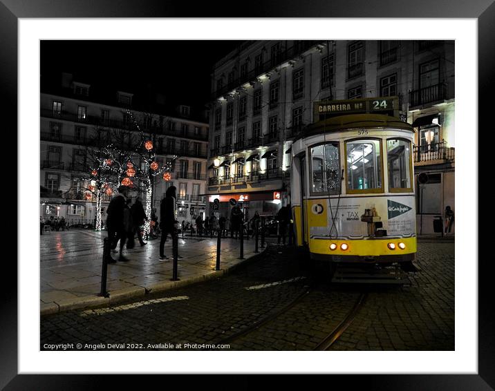 Electrico at night in Lisbon Framed Mounted Print by Angelo DeVal