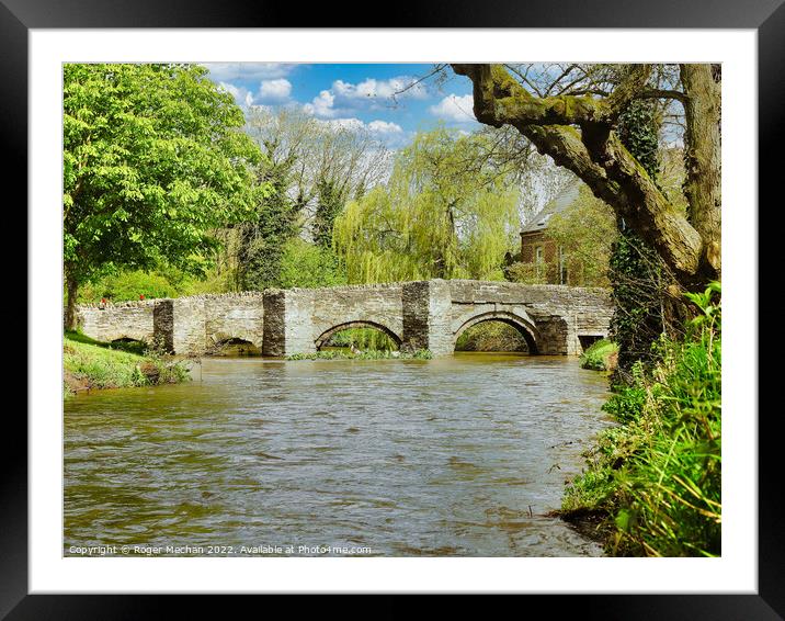 Ancient Stone Bridge Amidst a Flood Framed Mounted Print by Roger Mechan