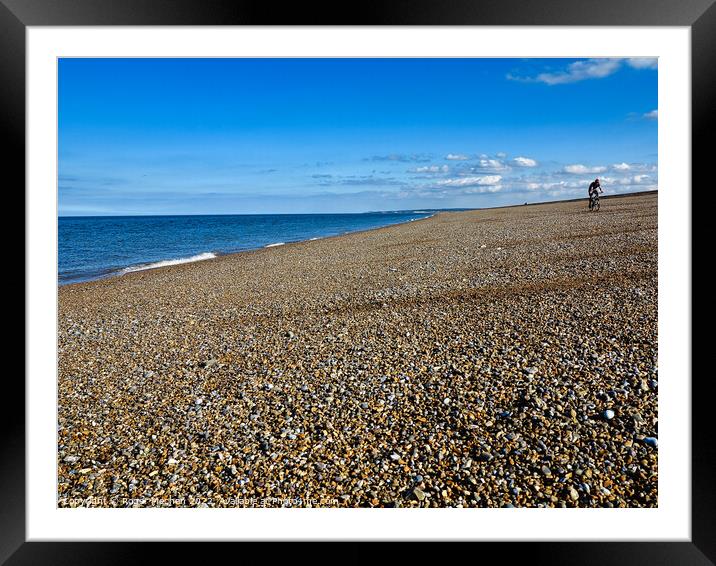 Serene solitude on Norfolk's beach Framed Mounted Print by Roger Mechan