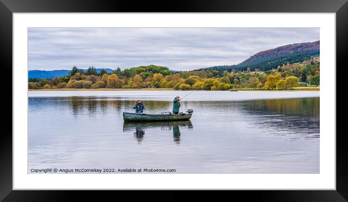 Trout fishing on Lake of Menteith Framed Mounted Print by Angus McComiskey