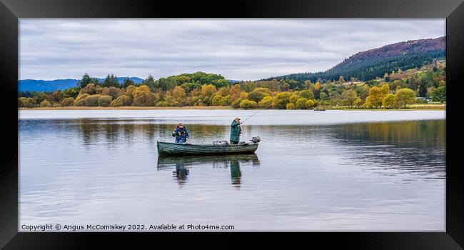Trout fishing on Lake of Menteith Framed Print by Angus McComiskey
