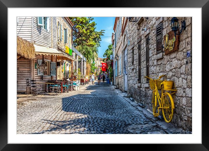 Cobbled street in Alacati, Izmir, Turkey Framed Mounted Print by Kevin Hellon