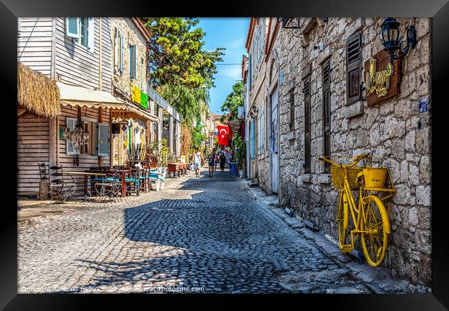 Cobbled street in Alacati, Izmir, Turkey Framed Print by Kevin Hellon