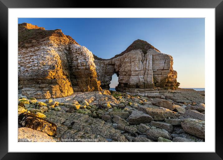 First light on Thornwick Nab Framed Mounted Print by Jim Monk