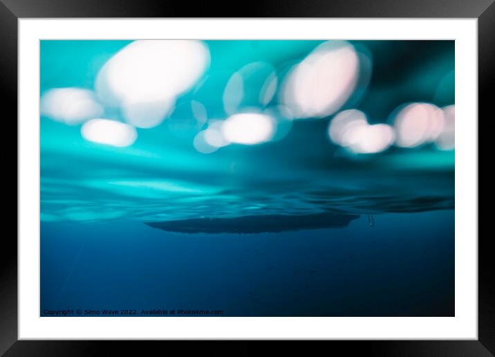 Boat in the sea underwater Framed Mounted Print by Simo Wave