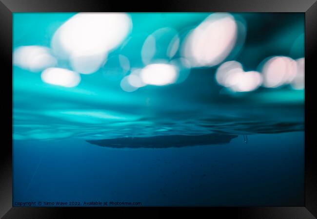 Boat in the sea underwater Framed Print by Simo Wave