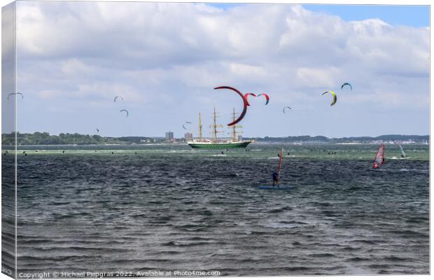 Lots of kite surfing activity at the Baltic Sea beach of Laboe Canvas Print by Michael Piepgras