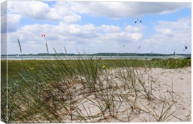 Lots of kite surfing activity at the Baltic Sea beach of Laboe Canvas Print by Michael Piepgras
