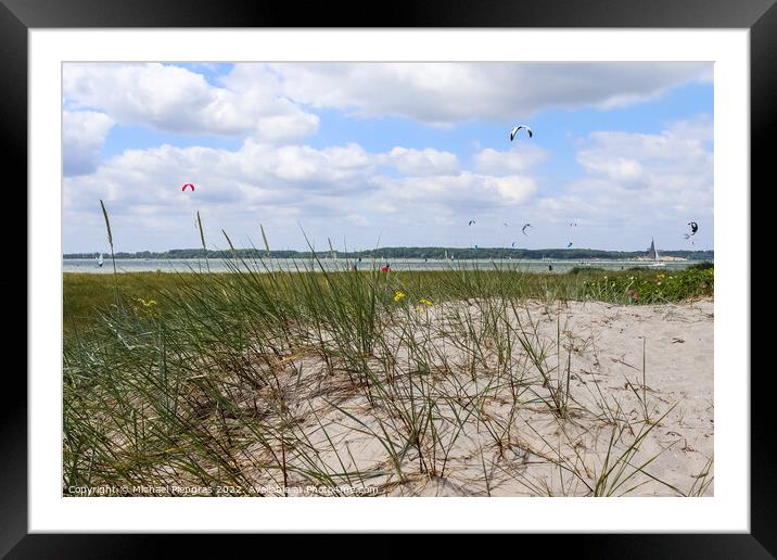 Lots of kite surfing activity at the Baltic Sea beach of Laboe Framed Mounted Print by Michael Piepgras