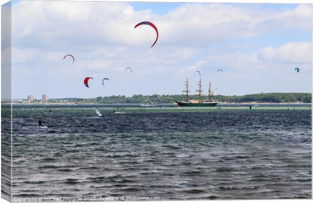 Lots of kite surfing activity at the Baltic Sea beach of Laboe i Canvas Print by Michael Piepgras