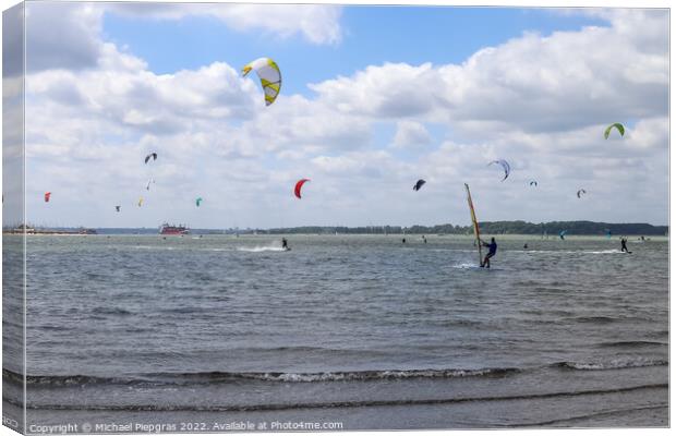 Lots of kite surfing activity at the Baltic Sea beach of Laboe i Canvas Print by Michael Piepgras