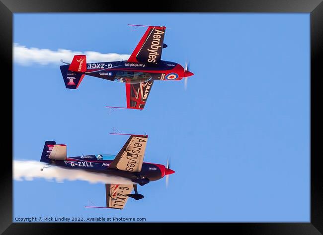 The Blades Mirror Formation Framed Print by Rick Lindley