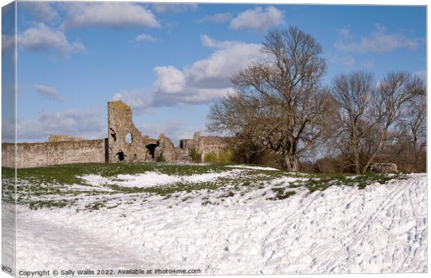 Pevensey Castle, Sussex, in snow Canvas Print by Sally Wallis