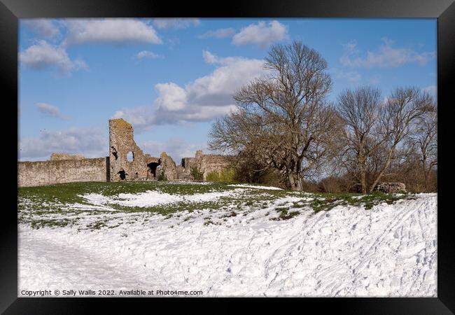Pevensey Castle, Sussex, in snow Framed Print by Sally Wallis