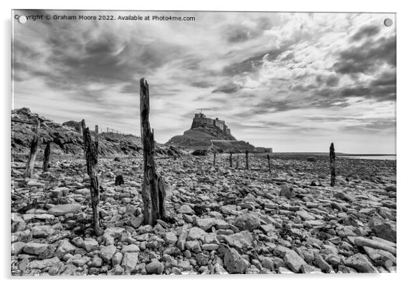 lindisfarne castle from the rocky shore monochrome Acrylic by Graham Moore