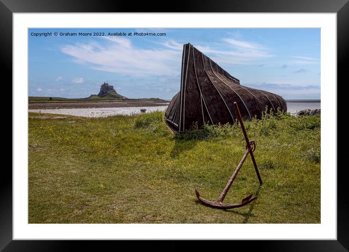 lindisfarne castle from the boat sheds Framed Mounted Print by Graham Moore
