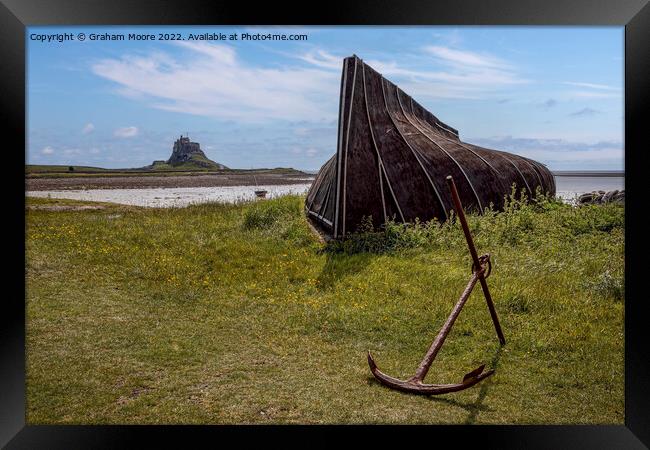 lindisfarne castle from the boat sheds Framed Print by Graham Moore
