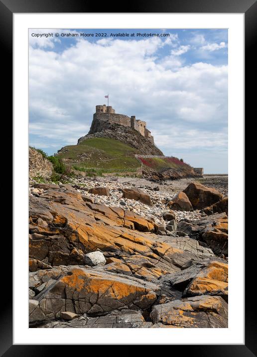 lindisfarne castle from the shore Framed Mounted Print by Graham Moore