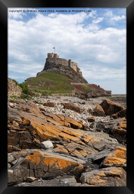 lindisfarne castle from the shore Framed Print by Graham Moore